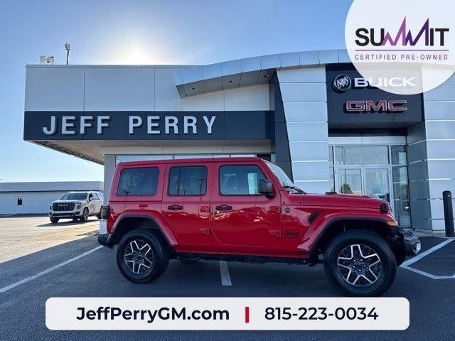 2025 Jeep Wrangler Sahara in Red — front three-quarter view