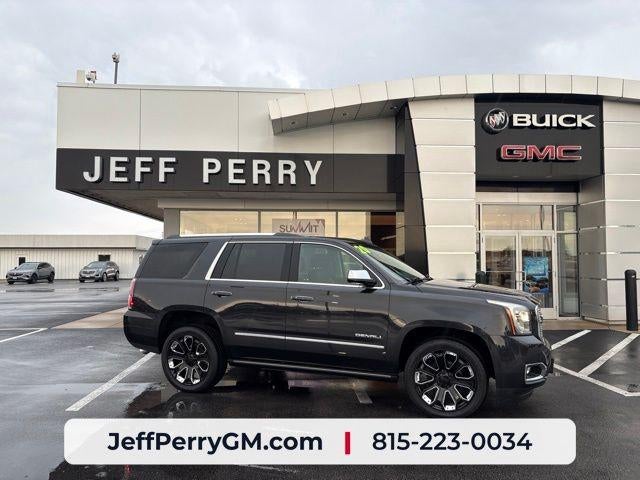 2020 GMC Yukon Denali in Carbon Black Metallic — front three-quarter view