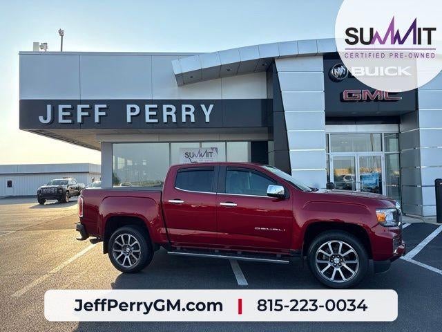 2021 GMC Canyon 4WD Denali in Cayenne Red Tintcoat — front three-quarter view