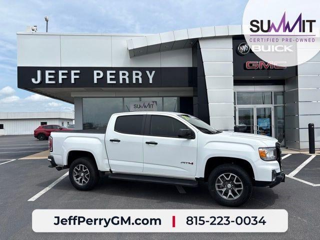 2021 GMC Canyon 4WD AT4 w/Leather in Summit White — front three-quarter view