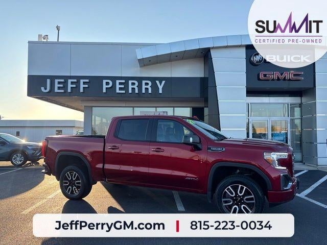 2021 GMC Sierra 1500 AT4 in Cayenne Red Tintcoat — front three-quarter view