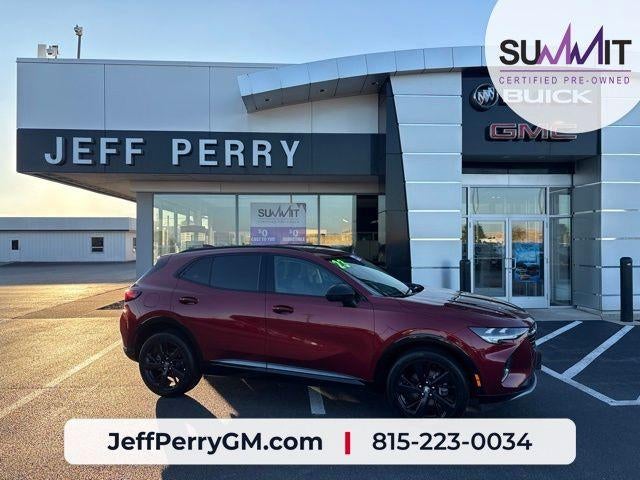 2023 Buick Envision Essence in Cinnabar Metallic — front three-quarter view
